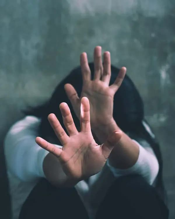 Therapist supporting a client through trauma recovery
